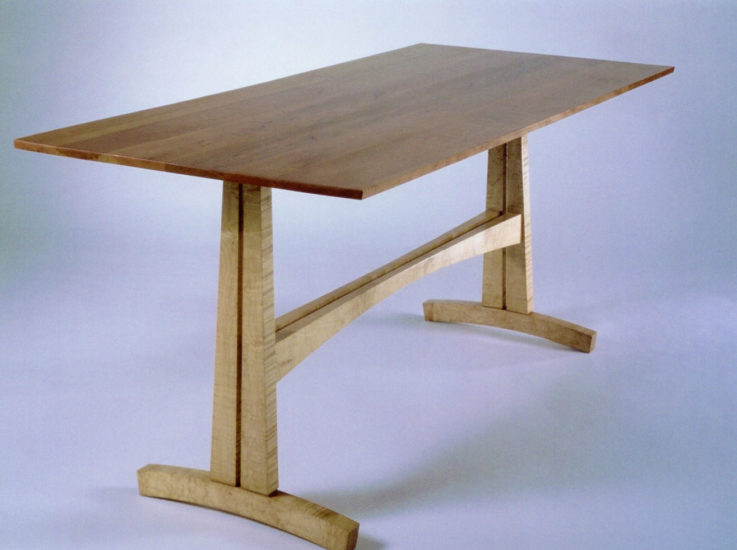Custom wood trestle table in Vermont cherry and Curly maple